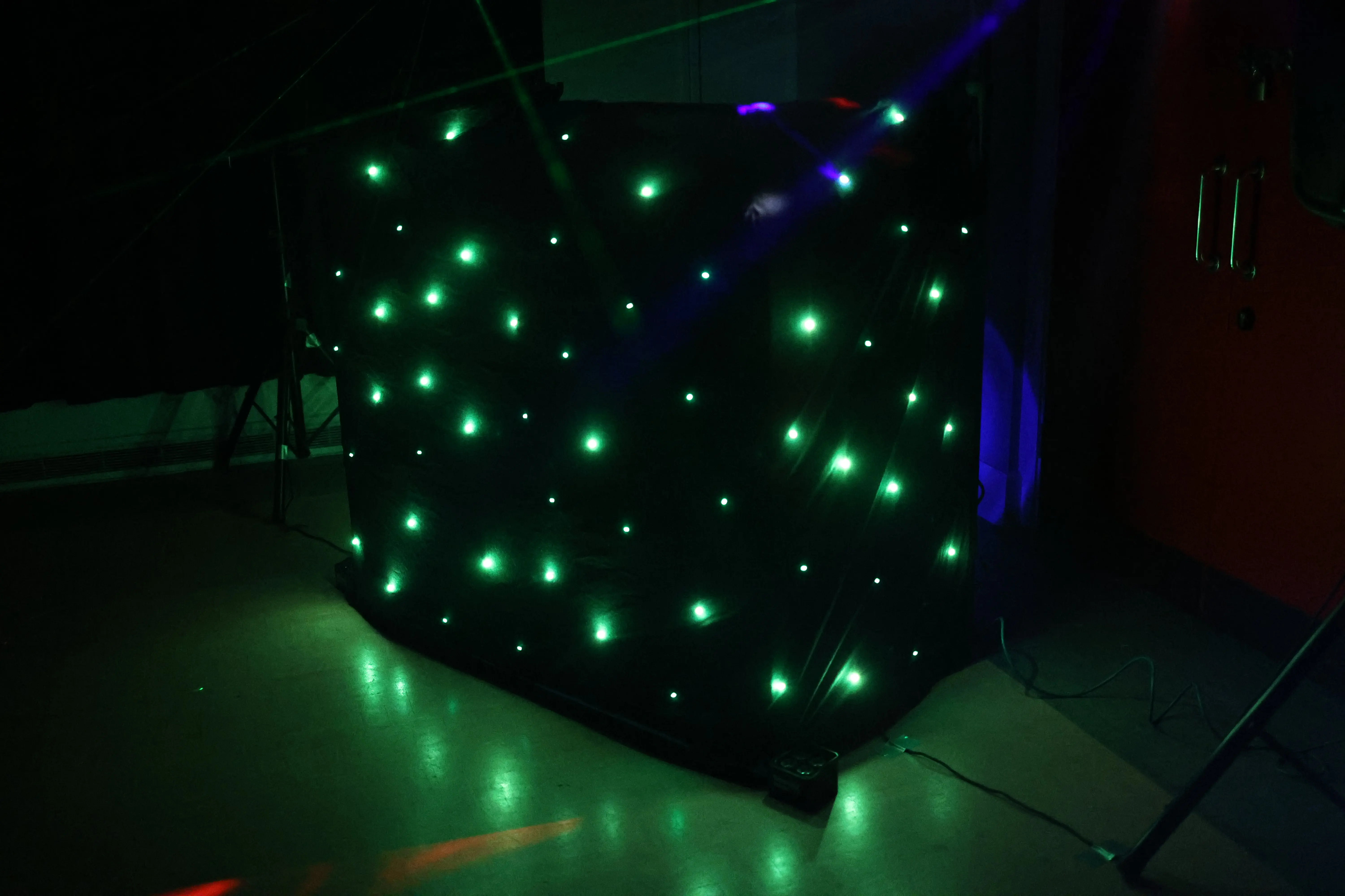 dj booth in a green phase of its dancing